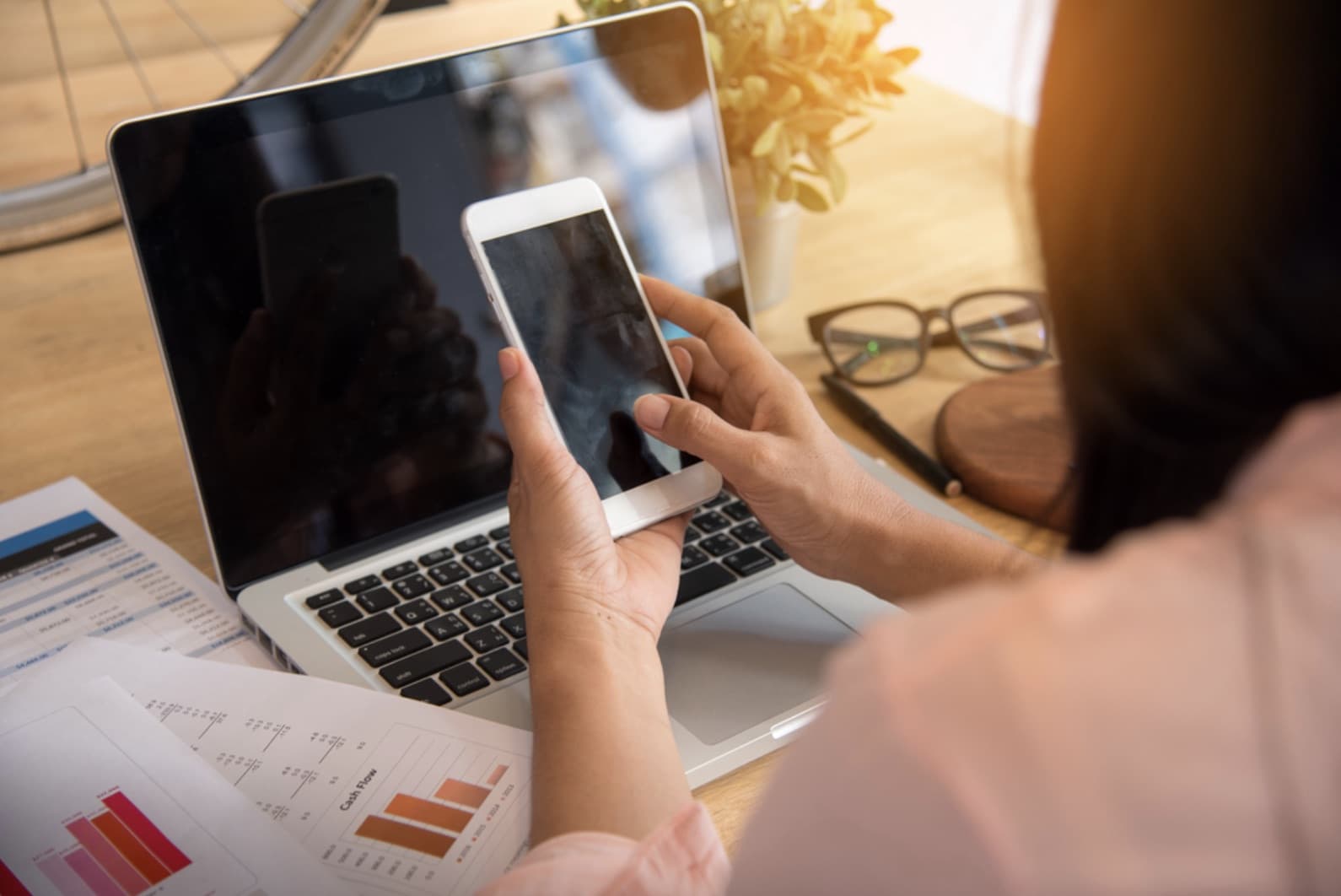 Phone and laptop featured in The Core Apple repair case study