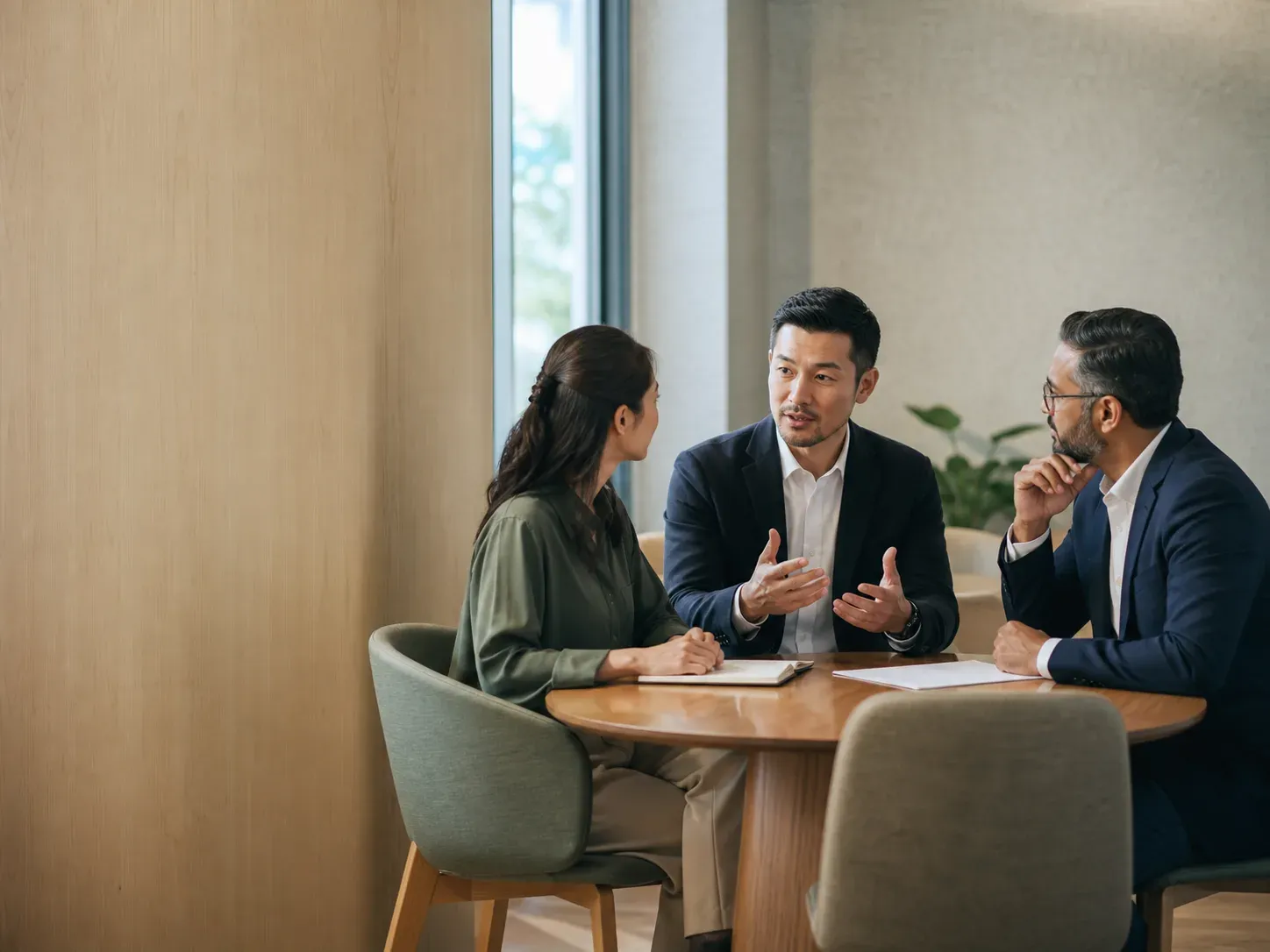 Professionals discussing a financial service