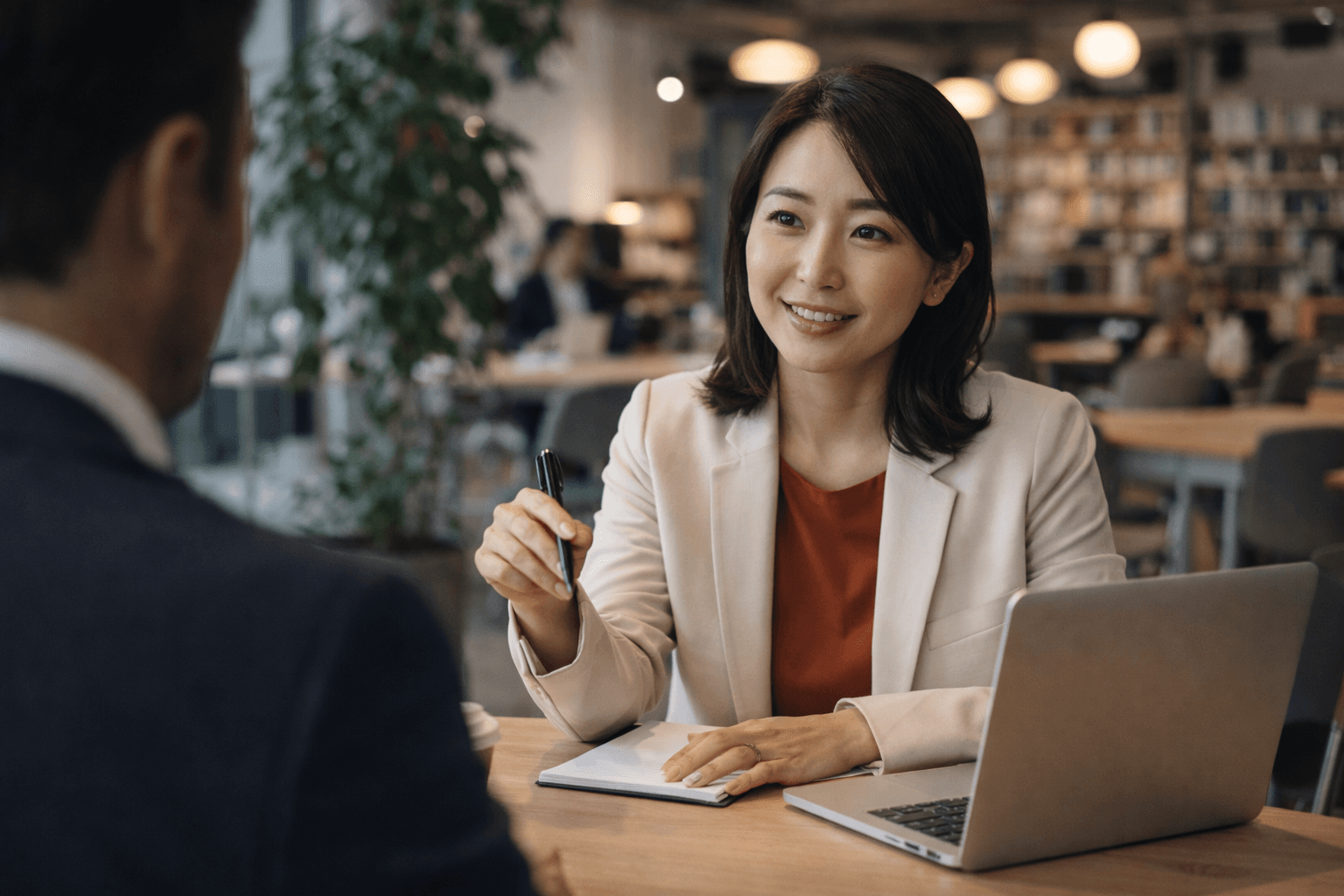 Professional smiling while working at a desk